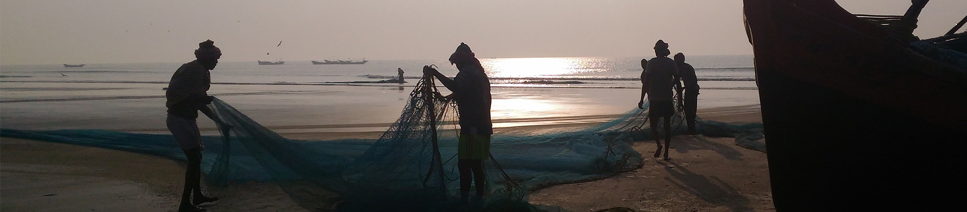 Fishermen putting out nets Fishermen putting out nets