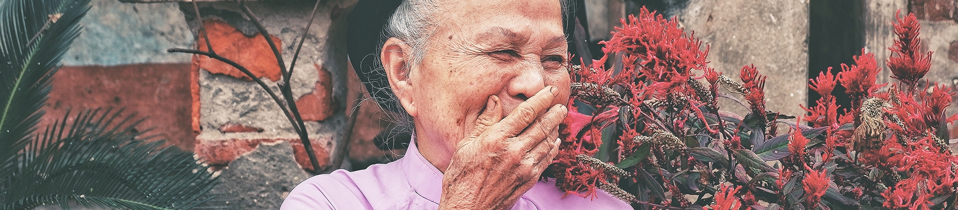 A elderly women laughing A elderly women laughing