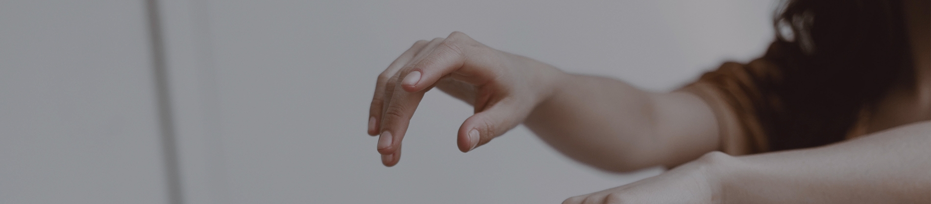 A women reaching out her hand A women reaching out her hand