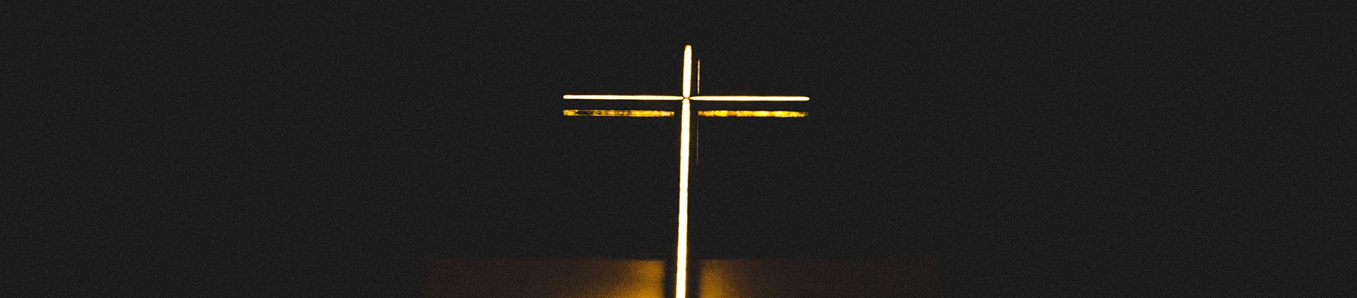 White and yellow lit up cross White and yellow lit up cross