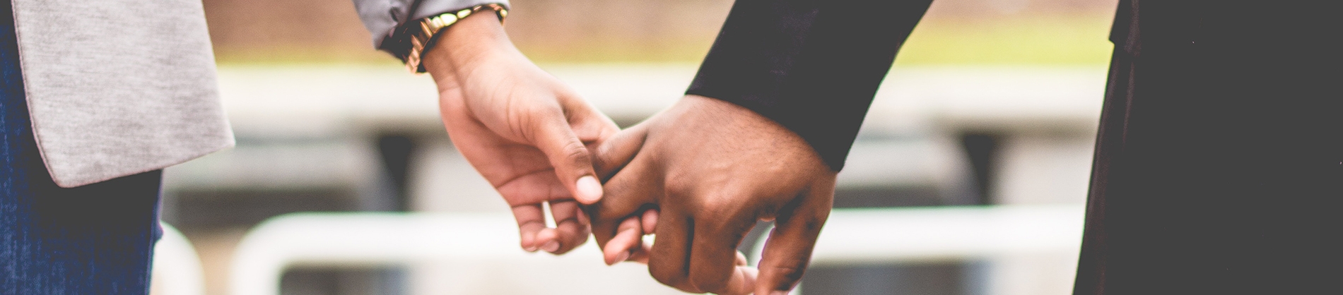 A couple holding hands