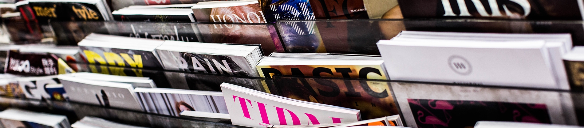 Magazine rack in a store Magazine rack in a store