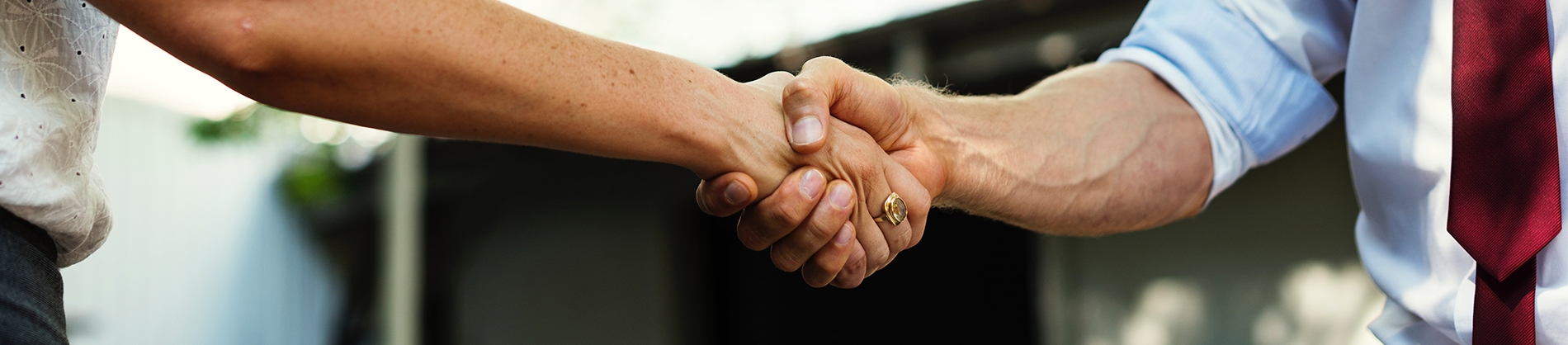 A man and women shaking hands A man and women shaking hands