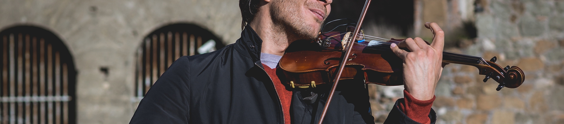 A man playing the violin A man playing the violin