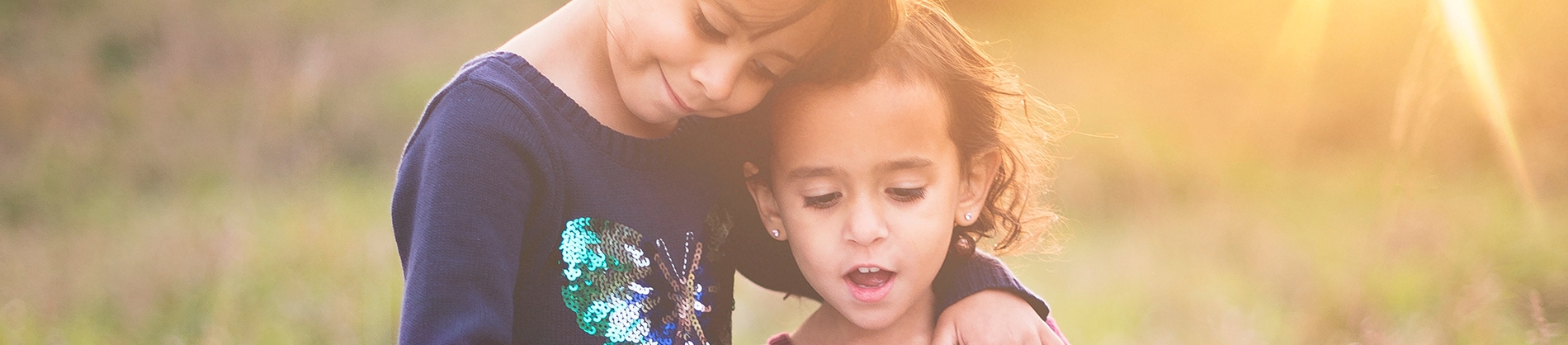 Two siblings stood together Two siblings stood together