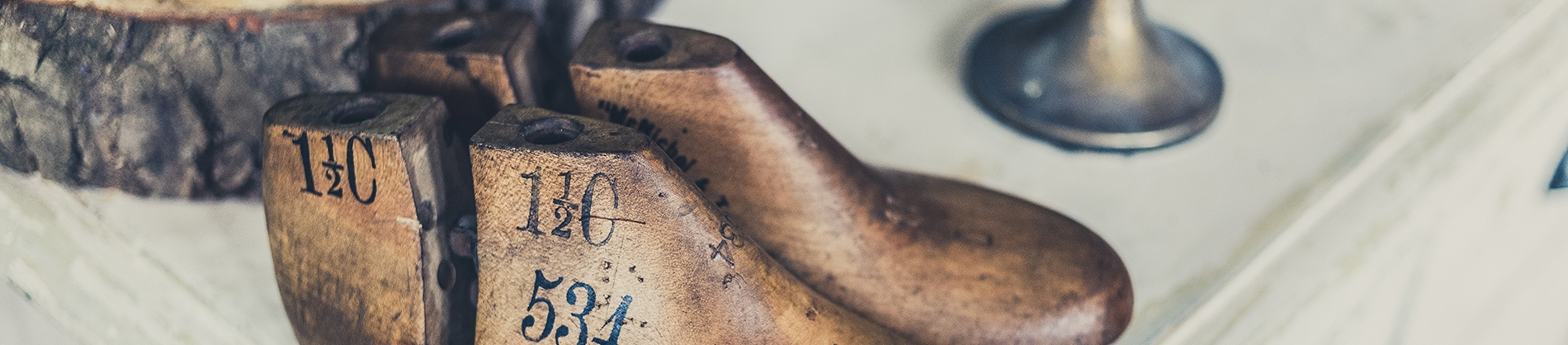 Wooden shoe mould on a table Wooden shoe mould on a table