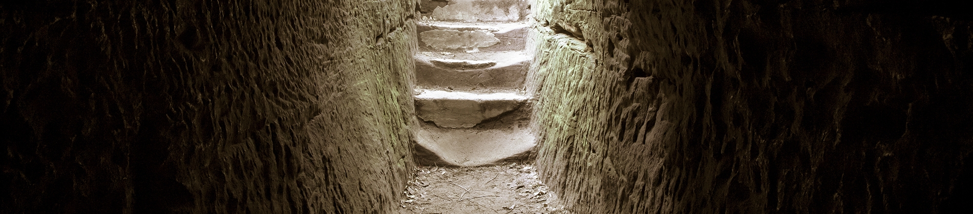 Steps up from inside a tomb into the light Steps up from inside a tomb into the light