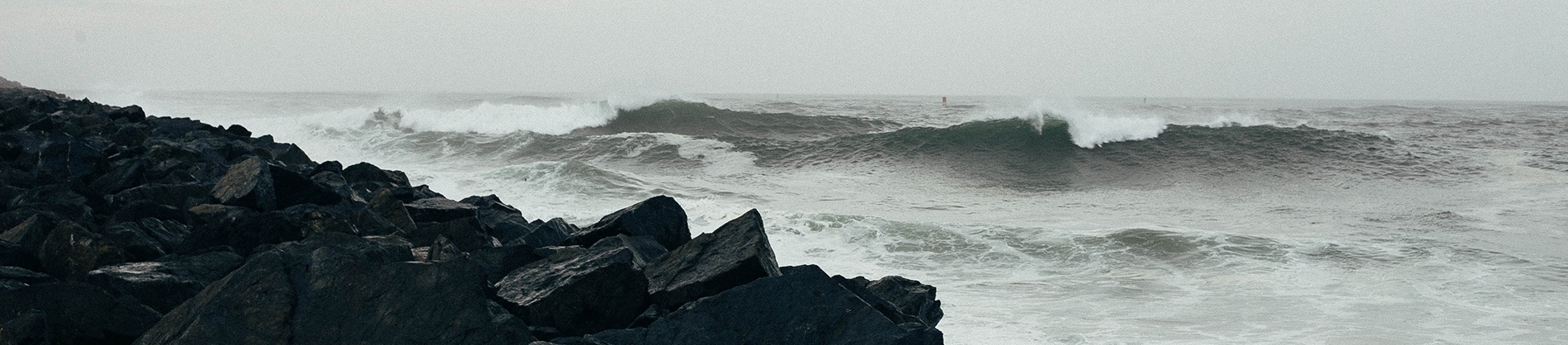 A stormy sea hitting rocks A stormy sea hitting rocks