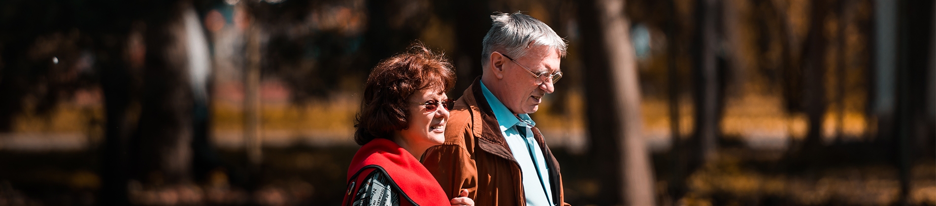 Older couple walking along together