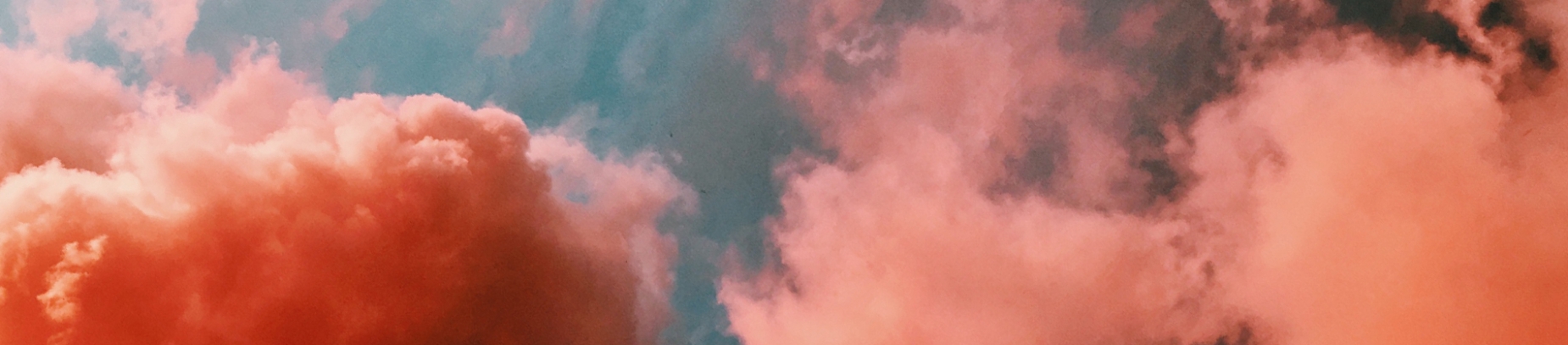 Pink and orange clouds in the sky Pink and orange clouds in the sky