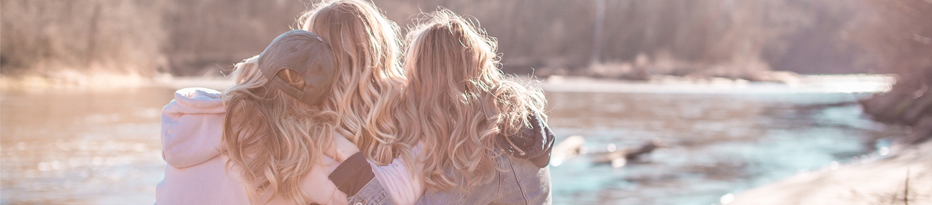 Two friends comforting another friend Two friends comforting another friend