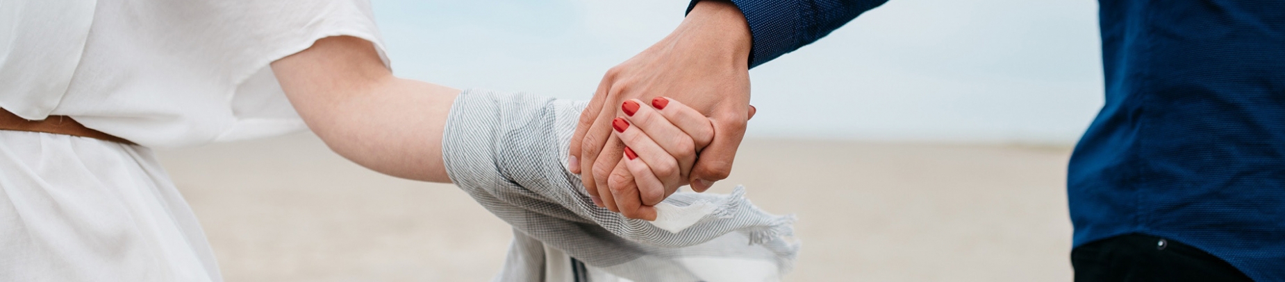 A man and a women holding hands A man and a women holding hands