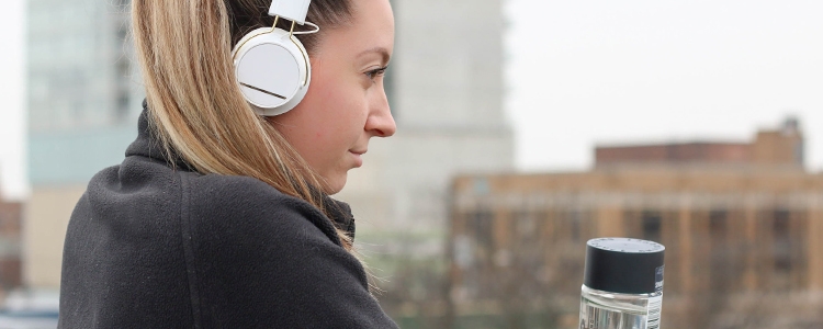 Lady out for a jog stops to listen to something captivating Lady out for a jog stops to listen to something captivating